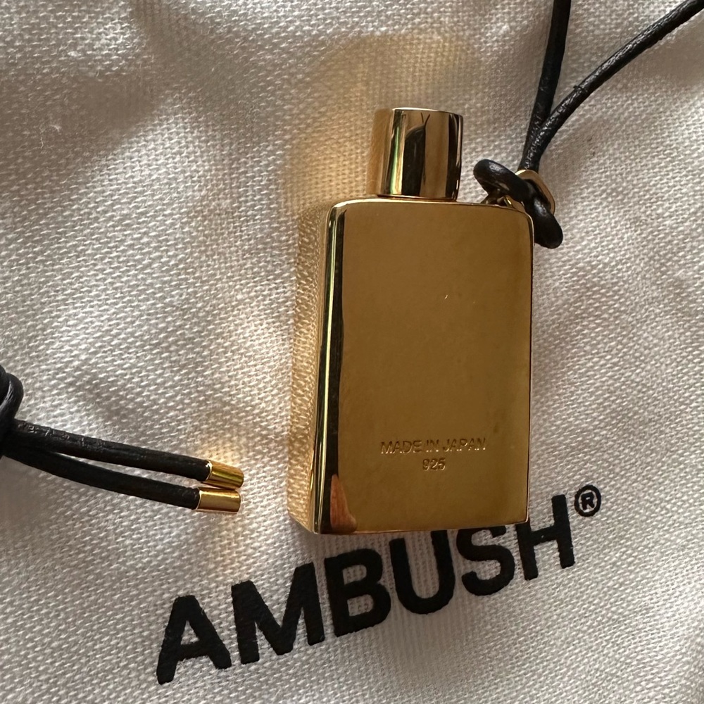 Ambush perfume bottle necklace.Rare item.